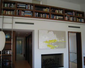 Cactus, Inc. Built-in bookcase with rolling ladder
